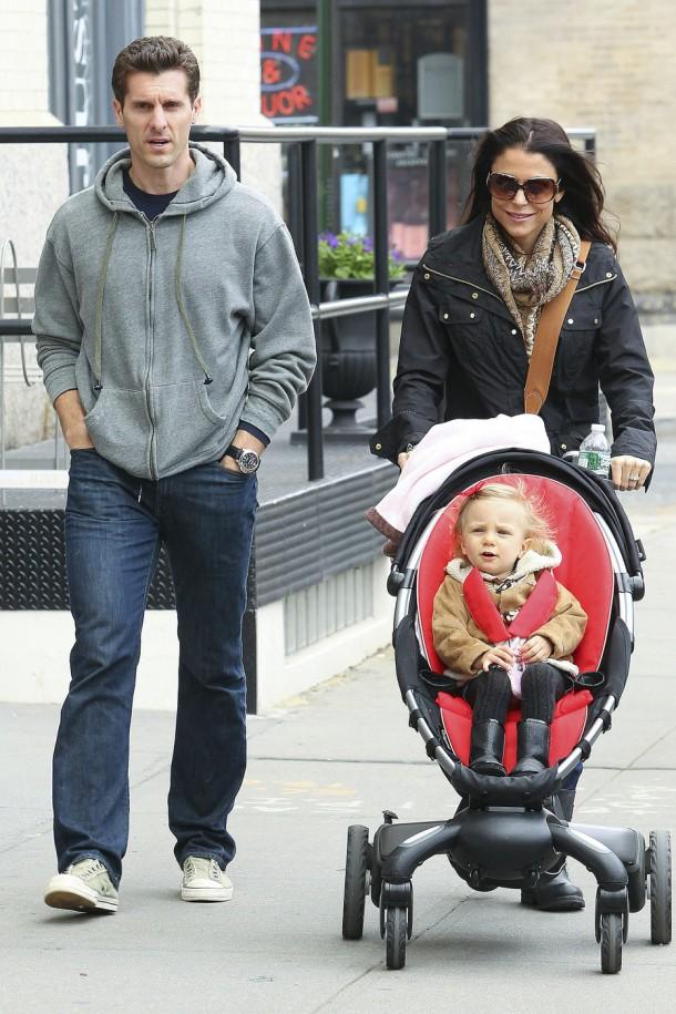 Bethenny Frankel, husband Jason Hoppy and their daughter Bryn go for a stroll together in Soho, one day after their two year wedding anniversary