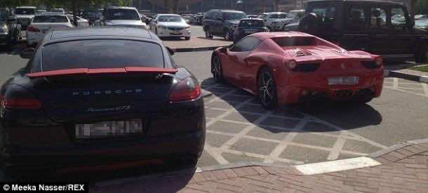 12 Porsche Cayenne GTS  and a Ferrari