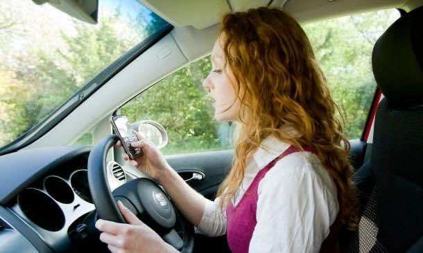 Girl texting whilst driving