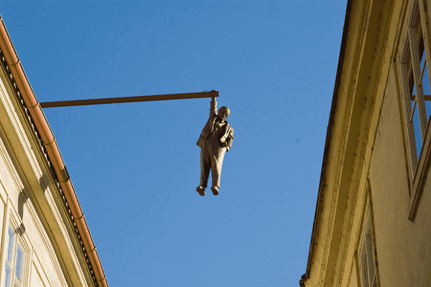 man-hanging-out-sculpture