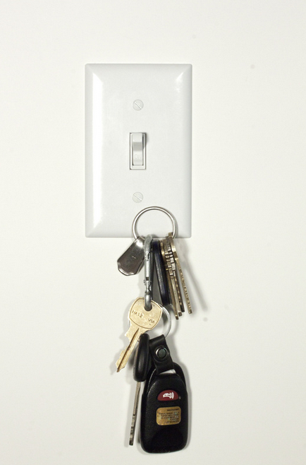 11. A magnetic light switch cover