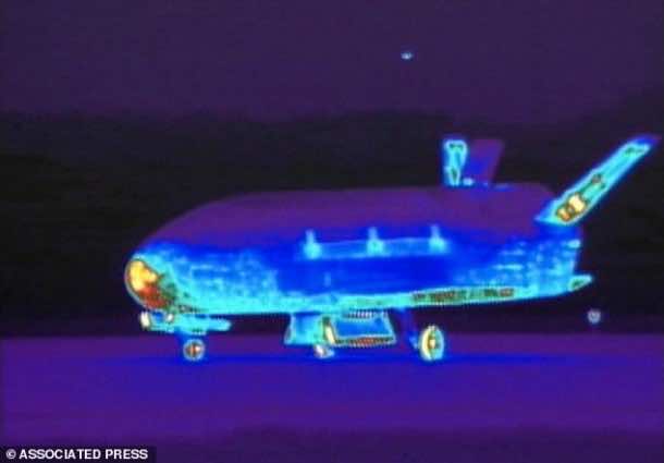 This June 16, 2012 file image from video made available by the Vandenberg Air Force Base shows an infrared view of the X-37B unmanned spacecraft landing at Vandenberg Air Force Base.  The purpose of the U.S. military's space plane is classified, only fueling speculation about why it has been orbiting Earth for nearly two years on this, its third mission. The plane is expected to land this week at a Southern California Air Force base.(AP Photo/Vandenberg Air Force Base, File)