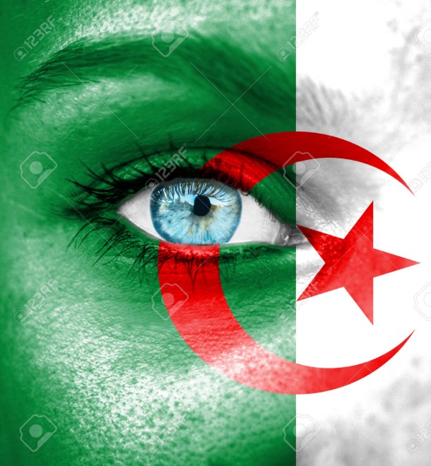 Woman face painted with flag of Algeria
