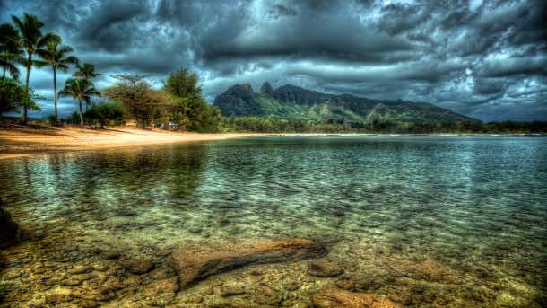 Taken during our recent visit to Kauai, this is one of the locations visited by Hawaiian Landmark Images EZ photo tour. http://www.hawaiianphotos.net/Kauaitours.htm Tonemapped HDR of a bay on Kauai. Canon 5D Mark II, 24-105mm f/4L at 24mm f/8 with polarizing filter, Photomatix Pro 3, Adobe Photoshop CS4, Topaz Denoise 3 Tonemapped using Detail Enhancer.