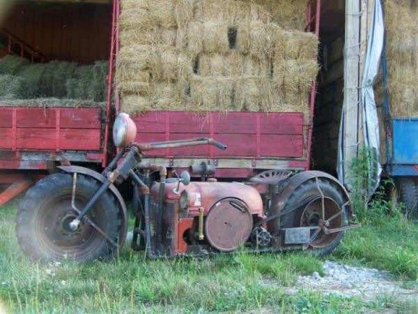 guy makes cycle from tractor parts2