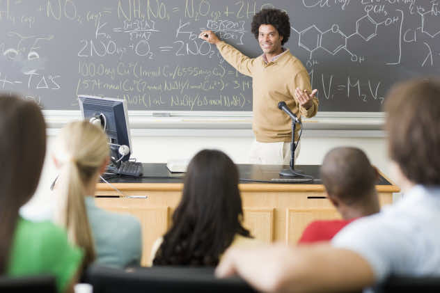 Lecturer at Blackboard During College Chemistry Class