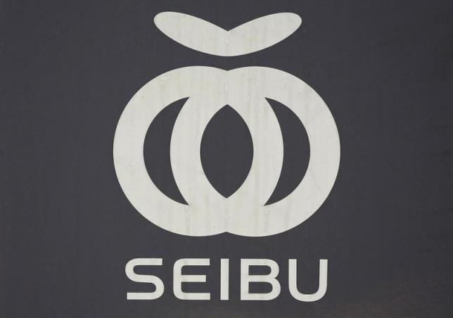 A logo of Seibu Railway Co., railway service unit of Seibu Holdings, is seen on the train coach at a station in Tokyo June 25, 2013. REUTERS/Issei Kato