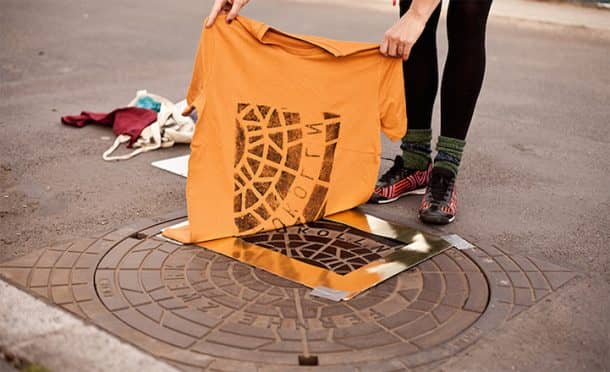 ‘Pirate Printers’ Use Manhole Covers To Print Urban Style Custom T-Shirt Designs_Image 0