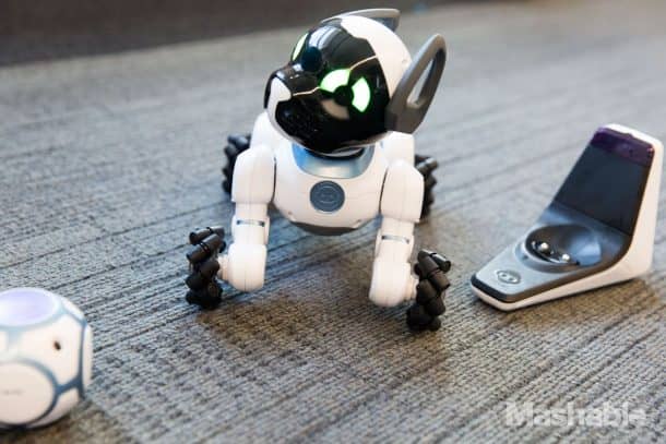WowWee CHiP ships with a charging base (right) and a SmartBall (left). Credits: Mashable