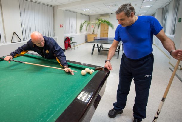 In this Thursday, March 19, 2015 photo provided by NASA, astronaut Scott Kelly, left, plays pool with Russian cosmonaut Mikhail Kornienko, of the Russian Federal Space Agency (Roscosmos), at the Cosmonaut Hotel in Baikonur, Kazakhstan. On Friday, March 28, 2015, Kelly and Kornienko will travel to the International Space Station to begin a year-long mission living in orbit. (AP Photo/NASA, Bill Ingalls)