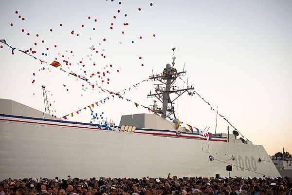 161016-N-AT895-183 BALTIMORE, (Oct. 16, 2016) Balloons fly and the crowd applauds as the Navy's newest and most technologically advanced warship, USS Zumwalt (DDG 1000), is brought to life during a commissioning ceremony at North Locust Point in Baltimore. (U.S. Navy photo by Petty Officer 1st Class Nathan Laird/Released)