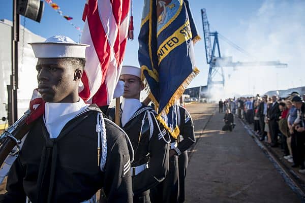 161015-N-AT895-366 BALTIMORE (Oct. 15, 2016) The color guard prepares to parade the colors during the commissioning ceremony for the Navy's newest and most technologically advanced warship, USS Zumwalt (DDG 1000). (U.S. Navy photo by Petty Officer 1st Class Nathan Laird/Released)