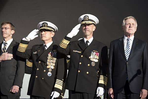 161016-N-AT895-014 BALTIMORE, (Oct. 16, 2016) (Left to right) Assistant Secretary of the Navy (Research, Development and Acquisition) Sean Stackley, Commander, U.S. Pacific Command(PACOM) Adm. Harry Harris, Chief of Naval Operations (CNO) Adm. John Richardson and Secretary of the Navy (SECNAV) Ray Mabus render honors for the national anthem during the commissioning ceremony for the Navy's newest and most technologically advanced warship, USS Zumwalt (DDG 1000). (U.S. Navy photo by Petty Officer 1st Class Nathan Laird/Released)
