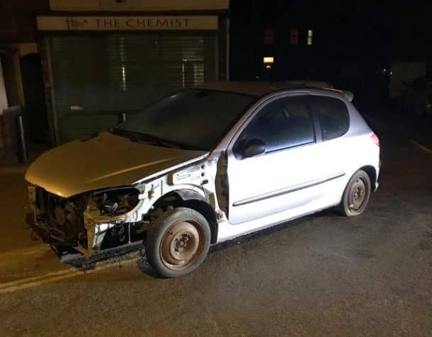 battered car driven with pliers and bucket seat
