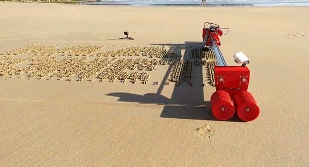 robotic printer that writes on sand