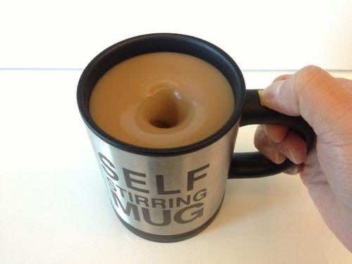 Self stirring coffee mug