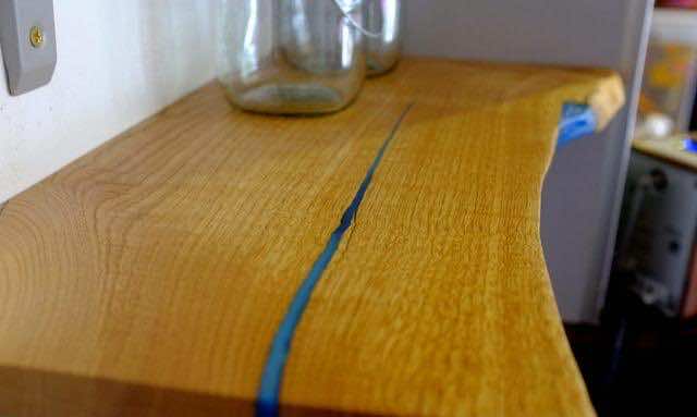 Simple DIY Makes Ordinary Wood Shelves Glow in the Dark