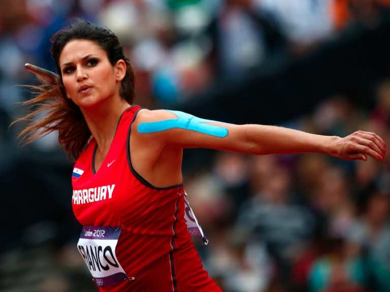 Here's Why Olympic Athletes Wear That Weird Tape On Their Bo