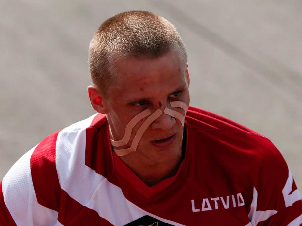 Here's Why Olympic Athletes Wear That Weird Tape On Their Bo