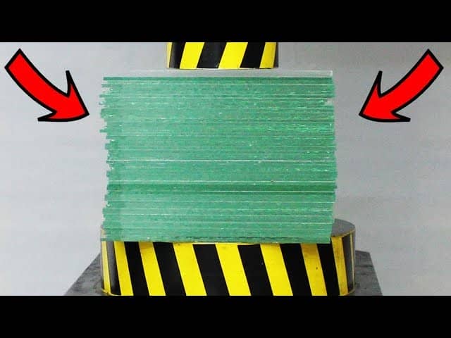 50 Sheets Of Glass Fighting A 100-Ton Hydraulic Press