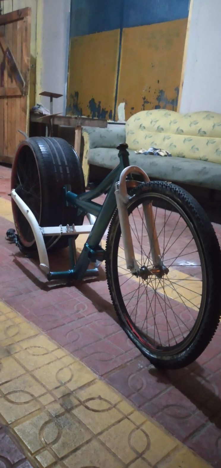 School Students Build Bicycles Using Car Tires and Scrap Mat